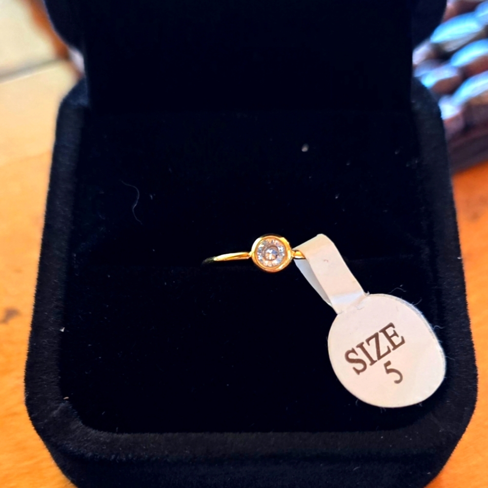 New 14 karat gold plated cubic zirconium pinky/knuckle ring. Size 5